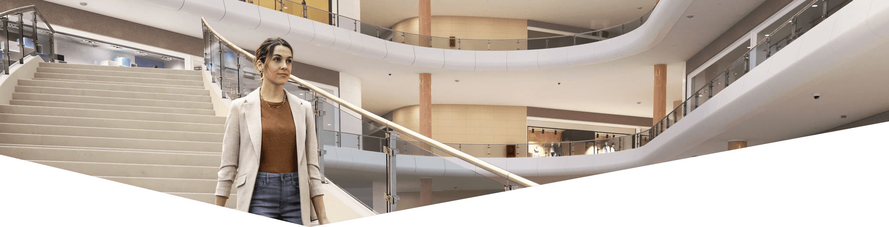 Woman walking down stairs inside building